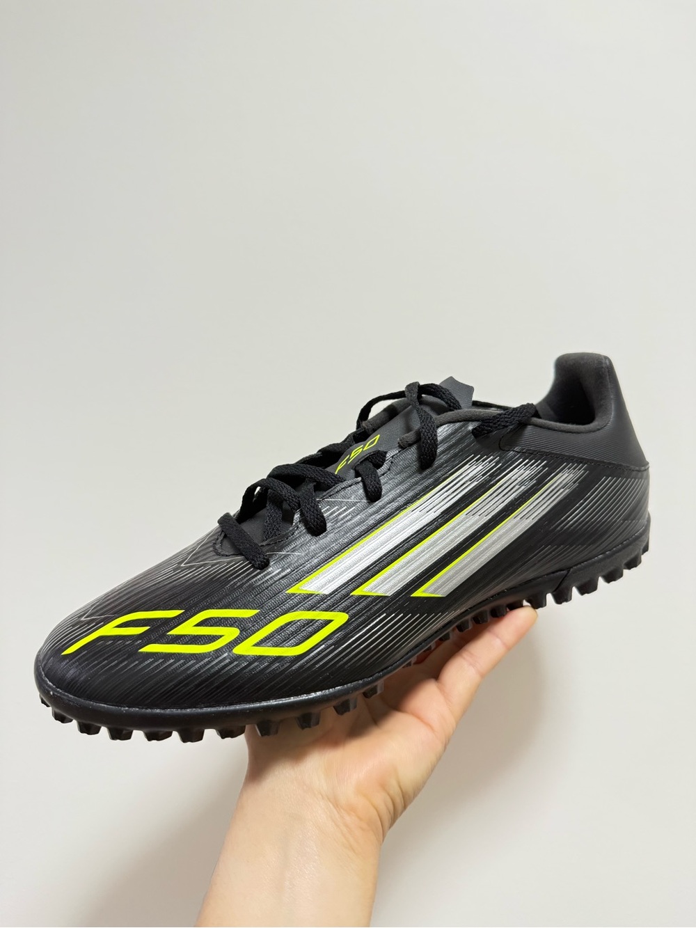 adidas Black F50 Turf Soccer Shoe with Neon Yellow Accents
